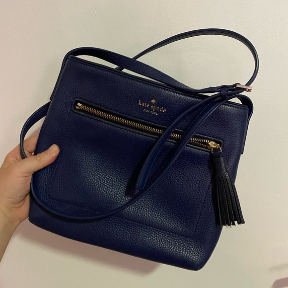 kate spade Handbags - Kate Spade blue great condition shoulder purse with pockets, zipper and tassel